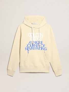 Marzipan-colored sweatshirt with lettering on the front