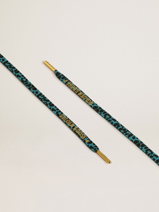 Light blue and black animal-print laces with contrasting gold-colored logo